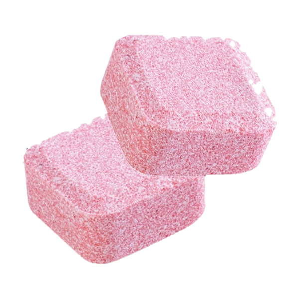 Two pink effervescent toilet cleaning tablets