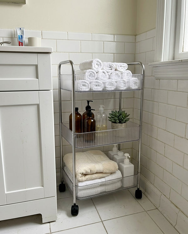 Rolling storage cart in a bathroom